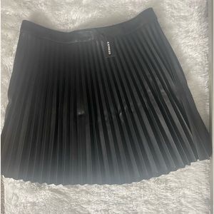 Never worn faux leather pleated skirt